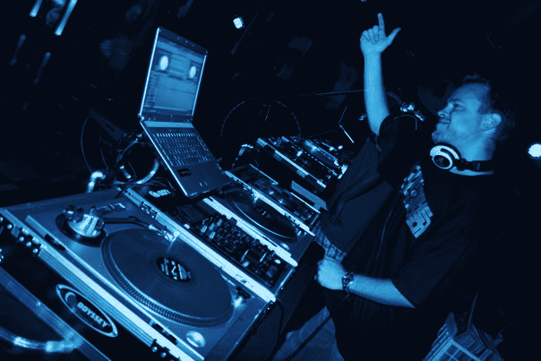 bsychld playing a live set, arm raised to the crowd